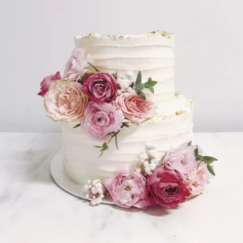 White Ruffles Fresh Blooms Wedding Cake