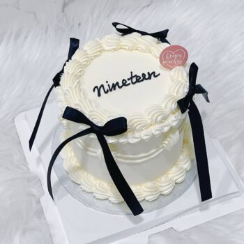 Black Ribbon Coquette Cake